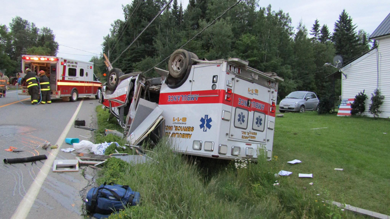 EMT driver flips ambulance after falling asleep at wheel, police say